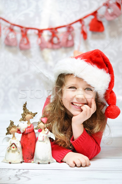 Beautiful little girl enjoying Christmas Stock photo © konradbak
