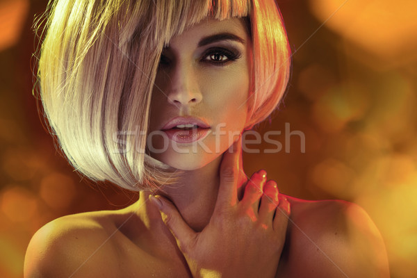 Calm and serious woman with the fantastic coiffure Stock photo © konradbak