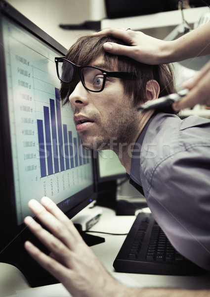 Office worker forced to work harder Stock photo © konradbak