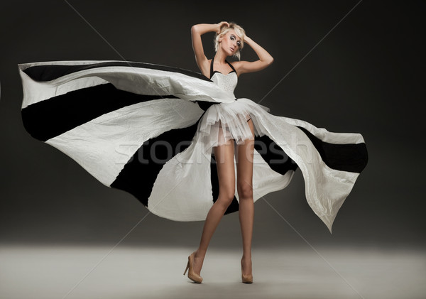 Mooie blond jurk vrouw dans haren Stockfoto © konradbak