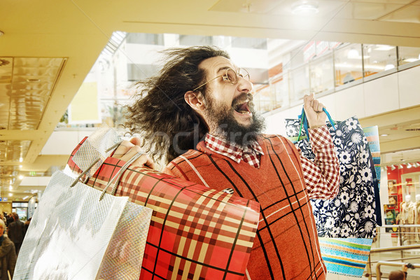 Funny guy on a shopping trip Stock photo © konradbak