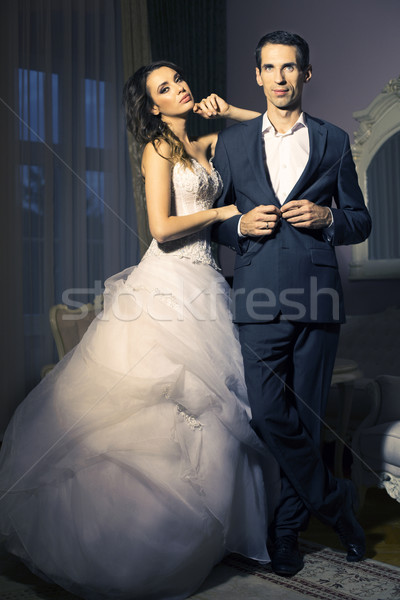 Portrait of attractive wedding couple Stock photo © konradbak