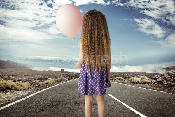 conceptual picture of a girl with a ballon Stock photo © konradbak