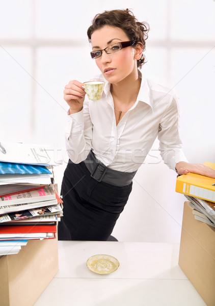 A secretary drinking coffee  Stock photo © konradbak