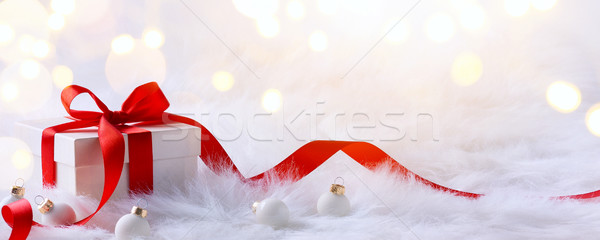Christmas card with gift boxes and Christmas decorations on a wh Stock photo © Konstanttin