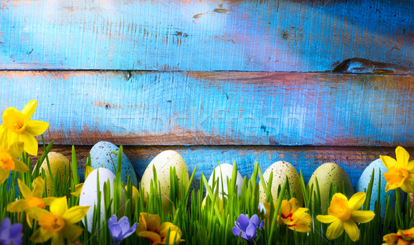 art Easter Background with easter eggs and spring flowers on gre Stock photo © Konstanttin