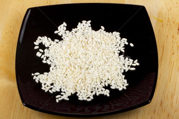 Rizs fehér nyers fekete tányér háttér Stock fotó © Koufax73