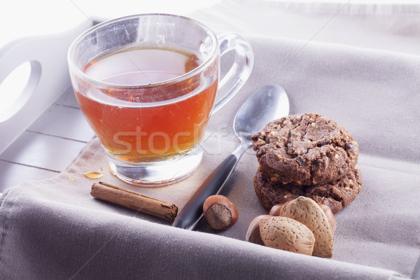 çay bisküvi fındık tarçın tepsi yatay Stok fotoğraf © Koufax73
