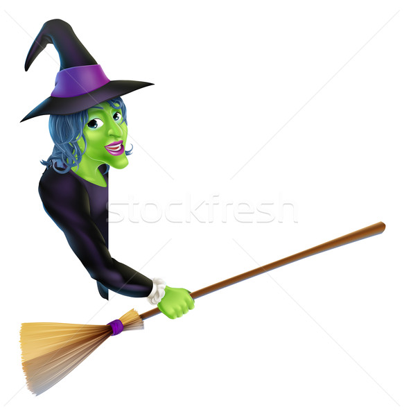 Halloween Witch Pointing with Broom Stock photo © Krisdog