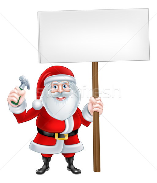 Stock photo: Santa Holding Sign and Hammer