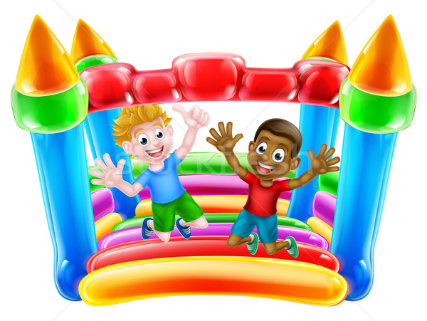 Kids Jumping on Bouncy Castle Stock photo © Krisdog