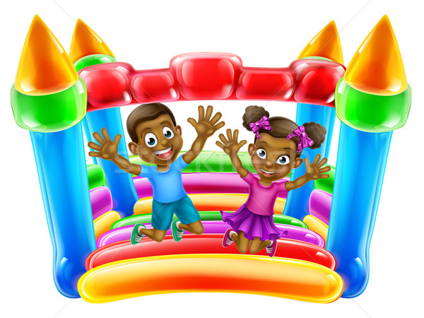 Children Jumping on Bouncy Castle Stock photo © Krisdog