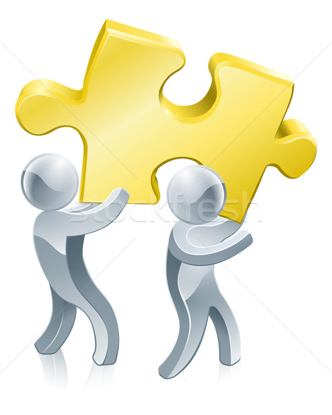 Completing jigsaw teamwork Stock photo © Krisdog