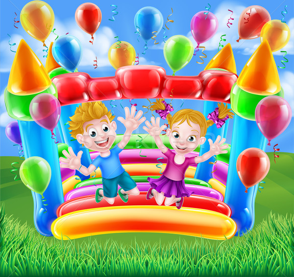Kids Jumping on Bouncy Castle Stock photo © Krisdog