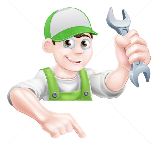 Man Holding Spanner and Pointing Stock photo © Krisdog