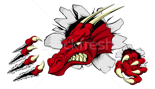 Red dragon mascot breaking through wall Stock photo © Krisdog