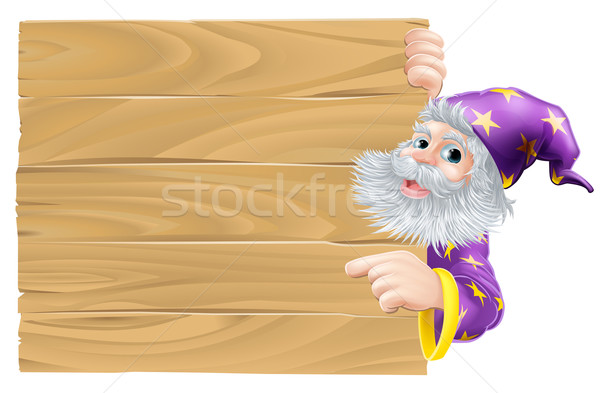 Cartoon wizard pointing sign Stock photo © Krisdog