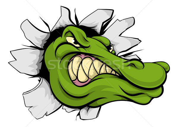 Stock photo: Crocodile or alligator head breaking through wall