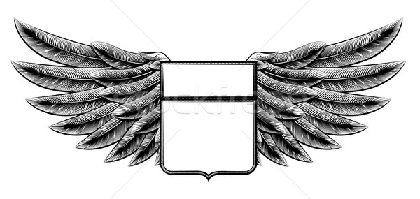 Vintage woodcut winged shield Stock photo © Krisdog