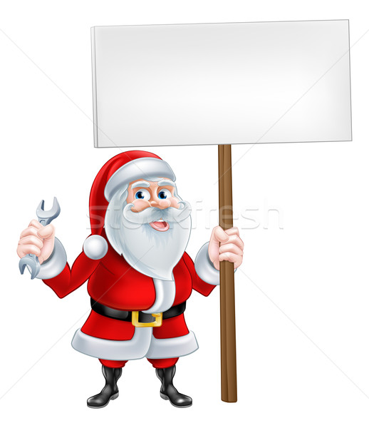 Santa Holding Wrench and Sign Stock photo © Krisdog