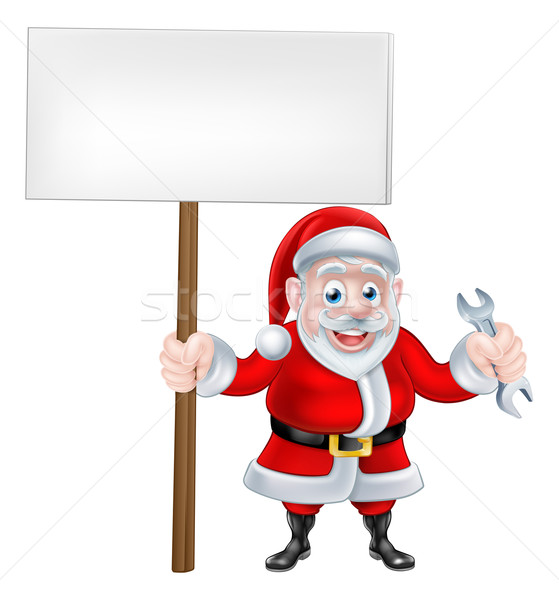 Cartoon Santa Holding Sign and Spanner Stock photo © Krisdog