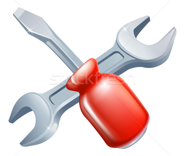 Crossed screwdriver and spanner tools Stock photo © Krisdog