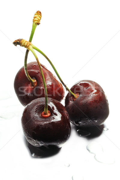Trois sweet cerises délicieux juteuse [[stock_photo]] © krugloff