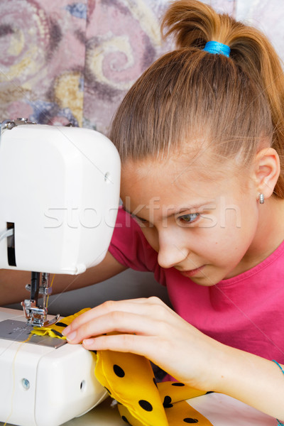 Girl learns to sew Stock photo © krugloff
