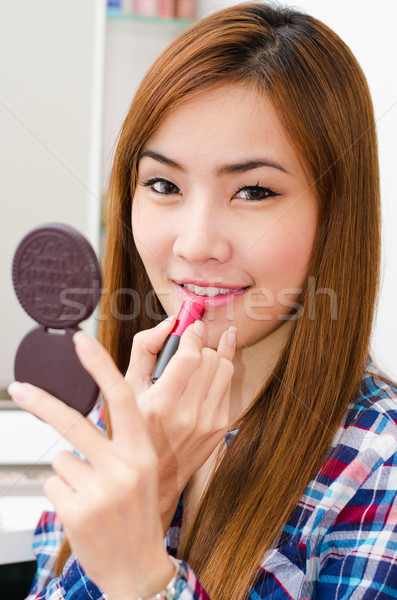 Asia nina lápiz de labios atractivo cute Foto stock © kttpngart