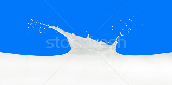 Melk splash geïsoleerd Blauw verf Stockfoto © kubais