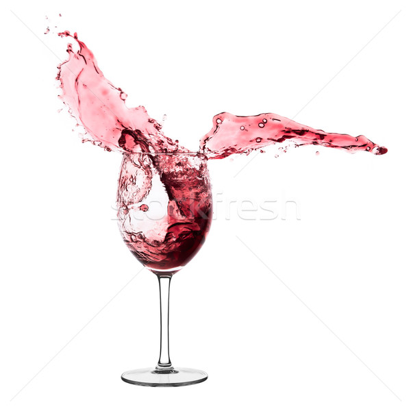 red wine splashing out of a glass, isolated on white Stock photo © kubais