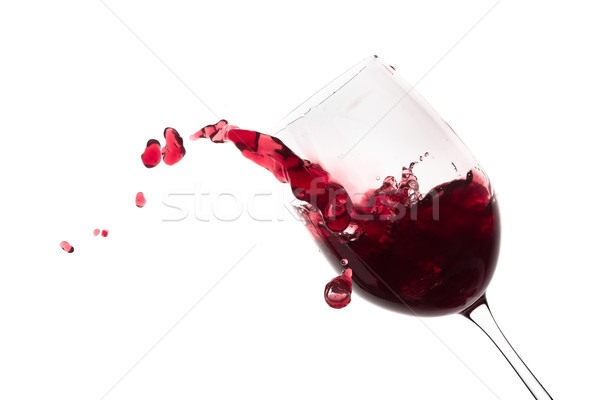 red wine splashing out of a glass, isolated on white Stock photo © kubais