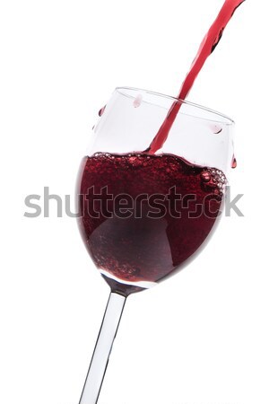 red wine splashing out of a glass, isolated on white Stock photo © kubais