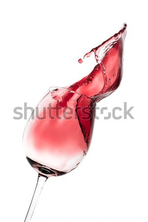red wine splashing out of a glass, isolated on white Stock photo © kubais
