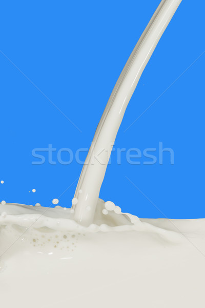 Melk splash geïsoleerd Blauw verf Stockfoto © kubais