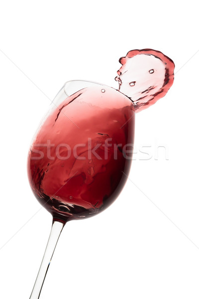 red wine splashing out of a glass, isolated on white Stock photo © kubais