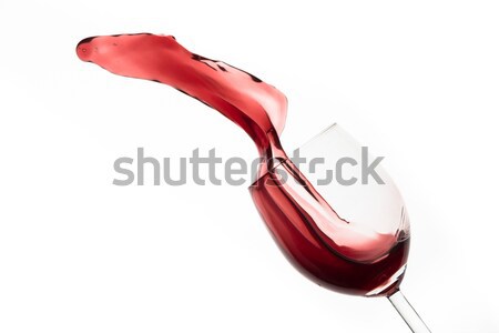 Vino rosso fuori vetro isolato bianco Foto d'archivio © kubais
