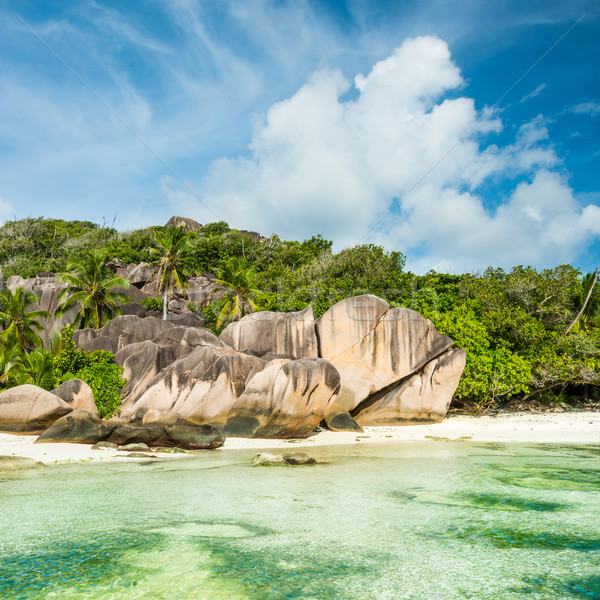 Praia granito turquesa mar céu água Foto stock © kubais