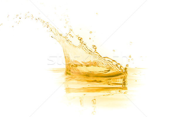 Jugo de naranja Splash aislado blanco verano petróleo Foto stock © kubais