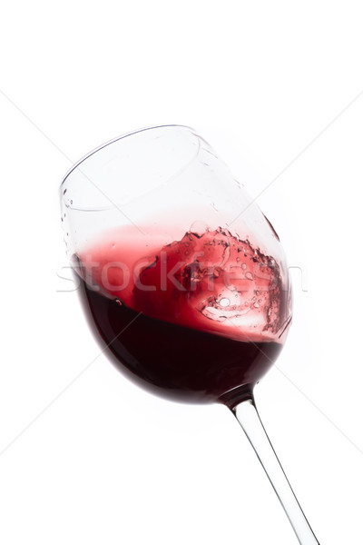 red wine splashing out of a glass, isolated on white Stock photo © kubais