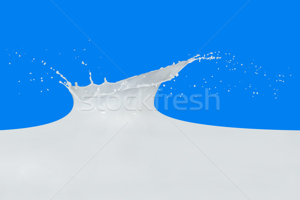Mleka splash odizolowany niebieski farby Zdjęcia stock © kubais