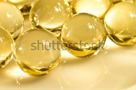 Olie capsules vitamine achtergrond groep Stockfoto © kubais