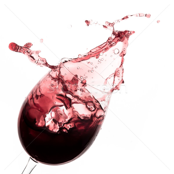 red wine splashing out of a glass, isolated on white Stock photo © kubais