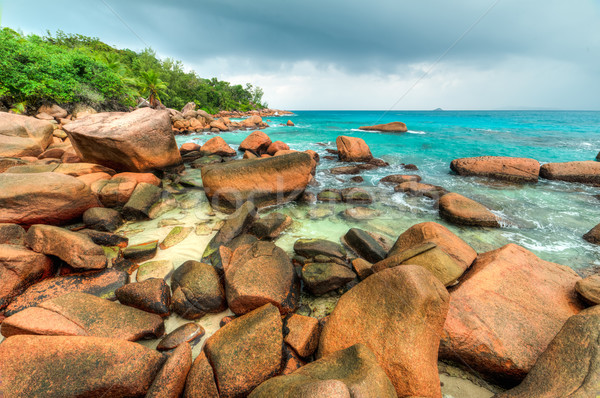 Strand eiland Seychellen stormachtig water landschap Stockfoto © kubais