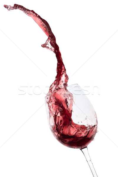 red wine splashing out of a glass, isolated on white Stock photo © kubais