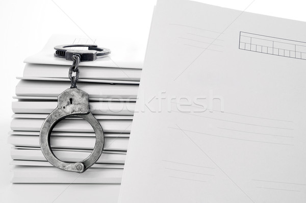 old metal handcuffs and blank case file Stock photo © kuligssen