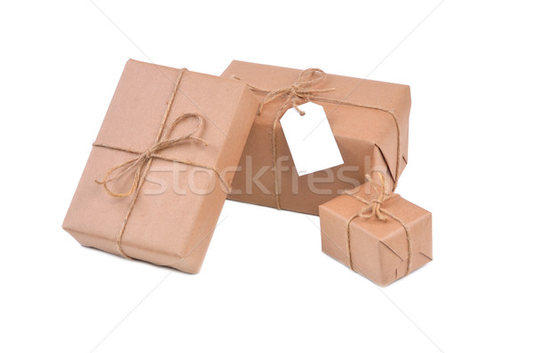 Três marrom pacotes isolado branco conselho Foto stock © kuligssen