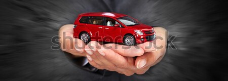 Hand with red car. Stock photo © Kurhan