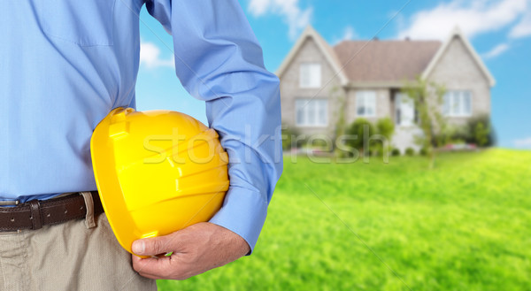 Construction worker with helmet. Stock photo © Kurhan