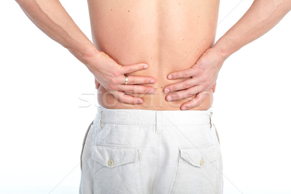 Bolnav om tânăr dureri de spate alb medical Imagine de stoc © Kurhan